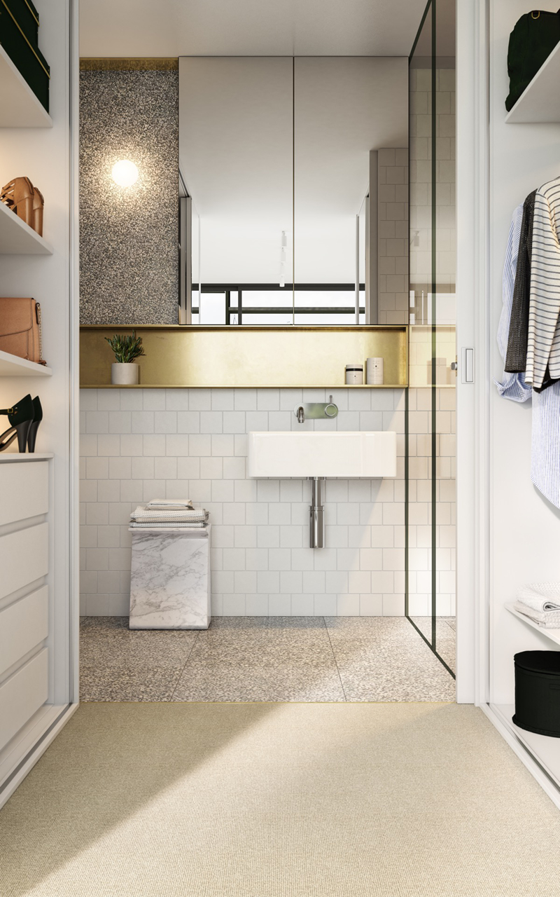 Nếu như bồn rửa và kệ đựng đồ bằng đá tách biệt thì kệ màu vàng bên trên tạo nên sự kết nối đặc biệt cho nội thất phòng tắm