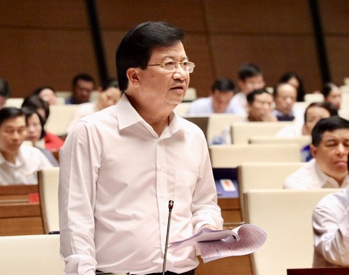 Phó Thủ tướng Trịnh Đình Dũng trả lời chất vấn tại Quốc hội - Ảnh: VGP/Nhật Bắc