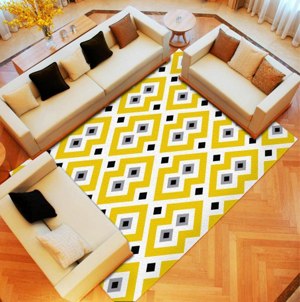 Một tấm thảm sặc sỡ tông xuyệt tông với những món nội thất khác là điểm nhấn đặc biệt cho căn phòng khách nhàm chán