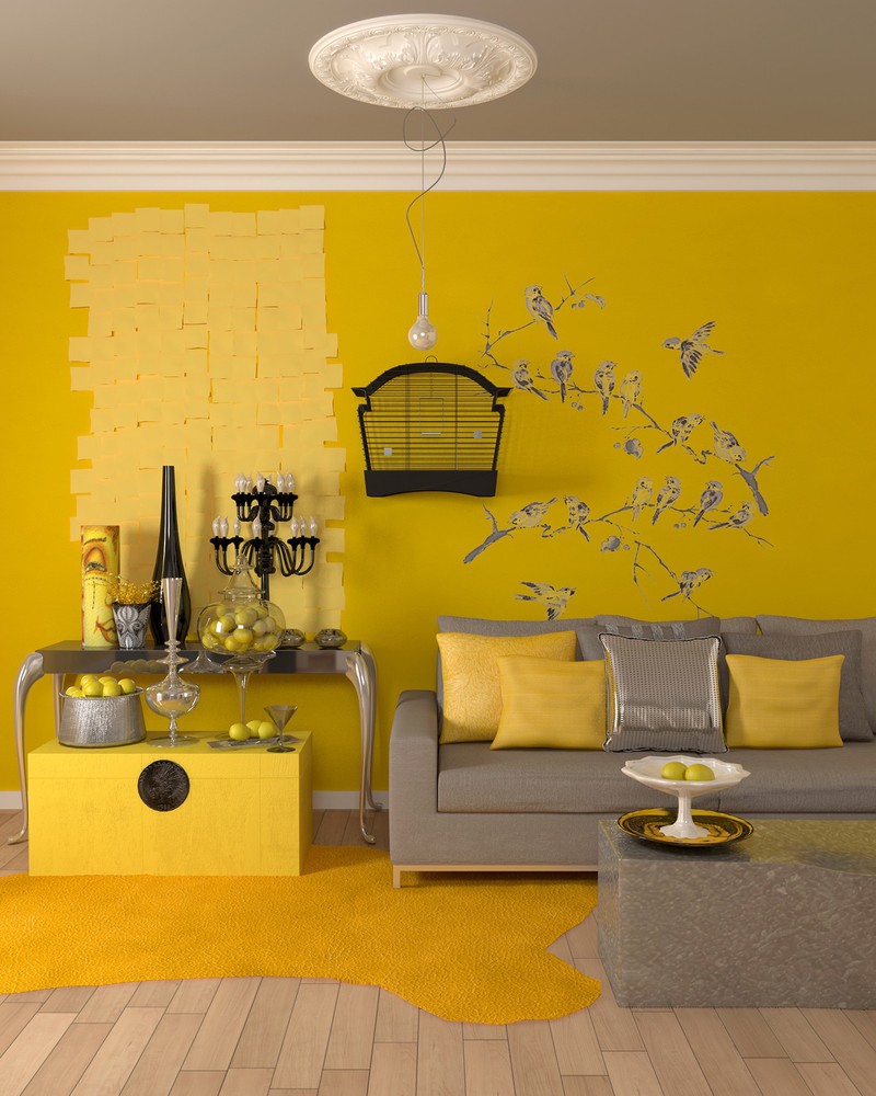 Bức tường, thảm trải sàn và một số đồ vật màu vàng chanh đã khiến cho phòng khách trở nên ấm áp và sang trọng hơn.