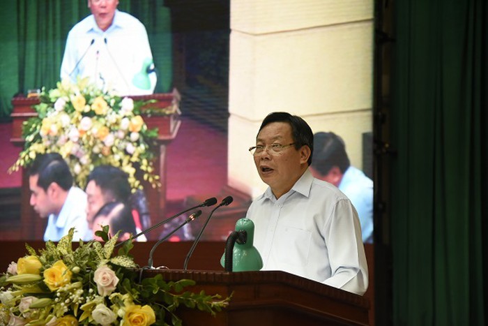 Trưởng Ban Tuyên giáo Thành ủy Hà Nội Nguyễn Văn Phong trình bày Nghị quyết 26 của Thành ủy về quản lý nhà chung cư
