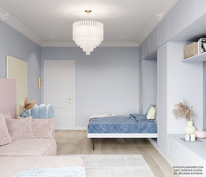 Phòng ngủ chính được bố trí với các gam màu xanh pastel làm chủ đạo.