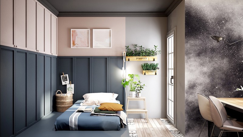 Phòng có thiết kế mở được sơn màu xanh khác hoàn toàn với tông màu xám của phòng ngủ đầu tiên