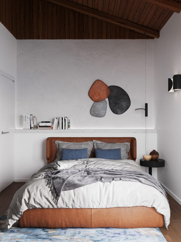 Chiếc giường ngủ bọc da mang lại màu sắc ấm cúng cho khu vực giường ngủ thứ 2. Bức tranh đầu giường đẩy cao yếu tố nghệ thuật cho căn phòng.
