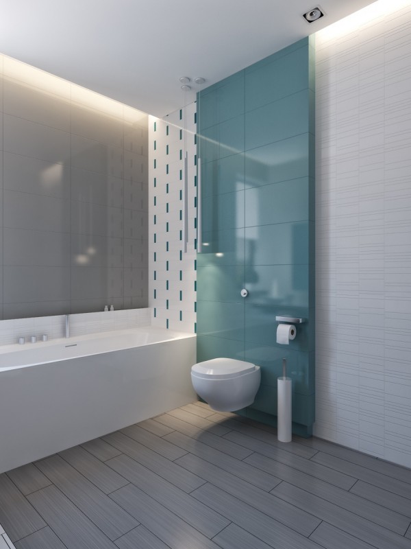 Bức tường màu xanh ngọc khiến phòng tắm trở nên mát mẻ, dễ chịu