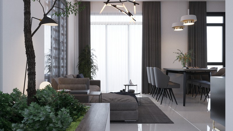 Cách bố trí phòng khách đơn giản, không quá cầu kỳ trong màu sắc và sử dụng đồ dùng nội thất. Cây xanh tăng yếu tố tự nhiên cho căn phòng.
