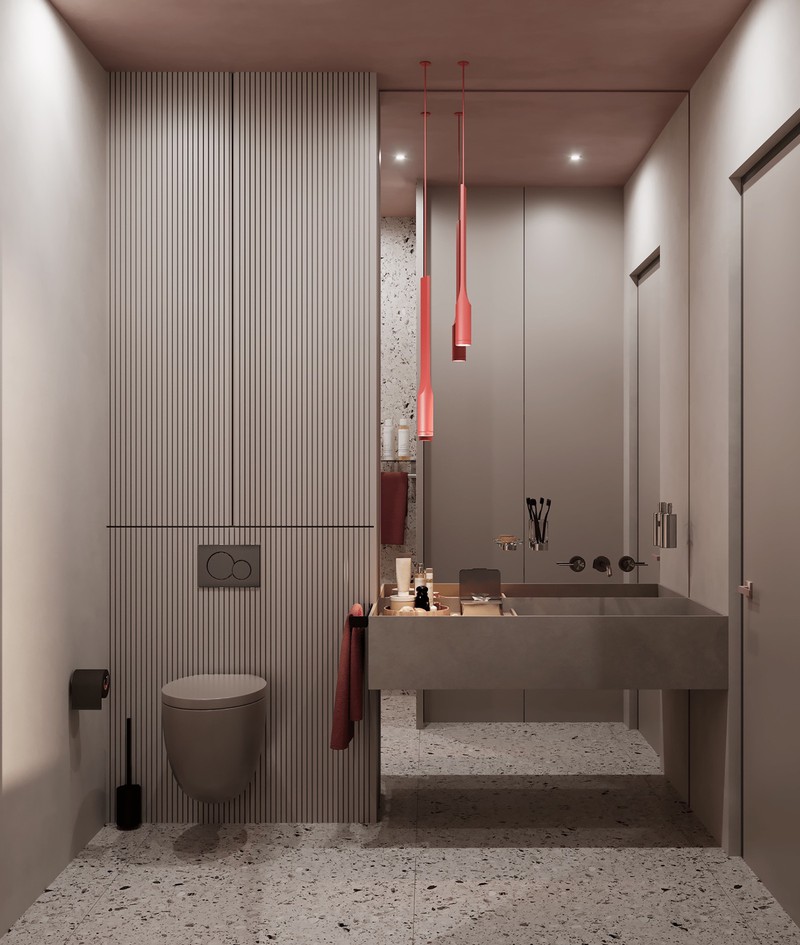 Phòng tắm trong căn hộ trang trí theo phong cách hiện đại, cộng thêm một vài điểm nhấn màu hồng trên đèn và khăn