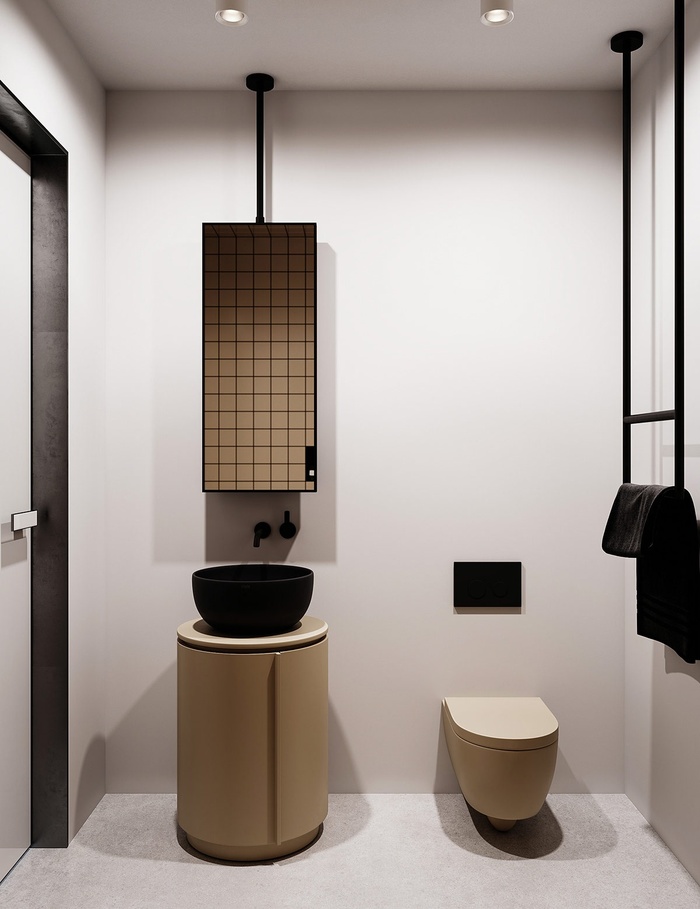 Nội thất phòng tắm khá đặc biệt với màu be độc đáo, tương phản với những bức tường màu xám