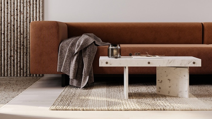 Ghế sofa nhung, bàn cà phê bằng đá cẩm thạch là những món nội thất tinh tế và đắt giá được sử dụng trong căn hộ này