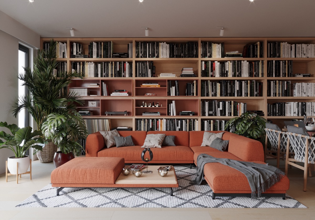Bằng cách di chuyển ghế sofa ra xa tường một chút, về phía trung tâm của căn phòng, bạn có thể tạo ra không gian rộng rãi để lắp đặt các giá sách phía sau nó