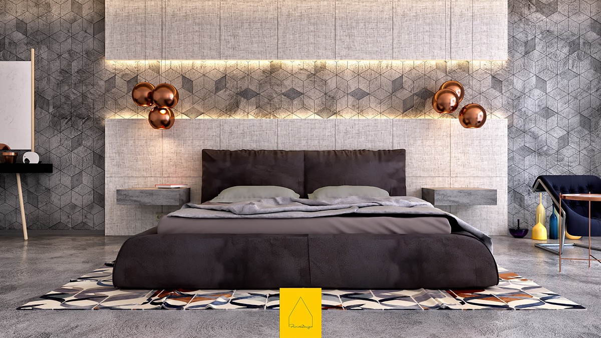 Phòng ngủ này tạo ra tác động trực quan ngay lập tức với bê tông kết cấu thô theo mô hình hình học sắc nét, với các tấm đầu giường quá khổ ở trên và dưới. Đèn mặt dây chuyền độc đáo của Tom Dixon lơ lửng phía trên bàn đầu giường công xôn (cũng bằng bê tông) và một tấm thảm có hoa văn sáng tạo năng lượng cho bảng màu.