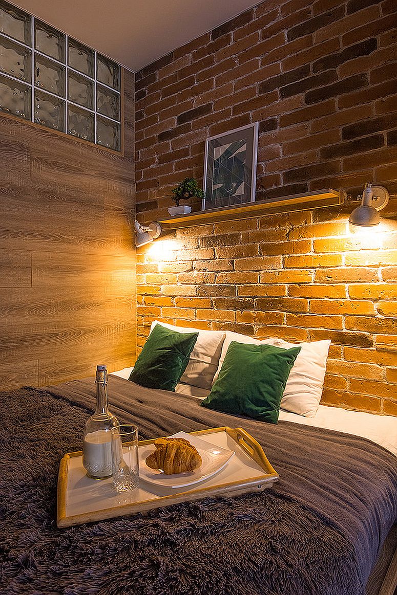 Đèn treo tường chiếu sáng bức tường gạch đầu giường trong phòng ngủ công nghiệp nhỏ