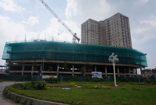 Tìm lối thoát cho nợ xấu bất động sản
