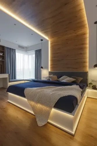 Các dải đèn chạy quanh rìa của khung giường tạo ánh sáng trên toàn bộ chân đế và đầu giường