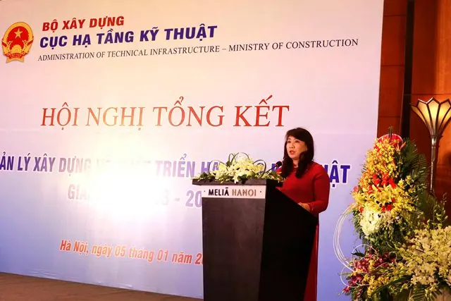 Cục trưởng Cục Hạ tầng kỹ thuật, PGS.TS Mai Thị Liên Hương báo cáo tại Hội nghị