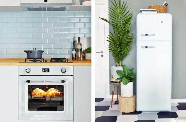 Tủ lạnh đặt gọn gàng sát tường bên cạnh chậu cây trang trí, tường nhà bếp ốp đá màu xanh mang lại cái nhìn tươi sáng cho khu vực này