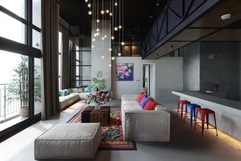Chùm đèn hình tròn màu vàng treo trên trần nhà được chiếu thẳng xuống bộ bàn ghế sofa đã tạo nên nét lung linh huyền ảo cho căn phòng được thiết kế đơn giản