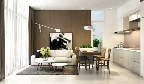 Cách bố trí theo thứ tự bếp, bàn ăn, và bàn ghế sofa từ cao tới thấp cho thấy sự tỉ mỉ của chủ nhân trong việc trang trí tổ ấm