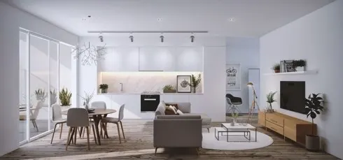 Mặc dù tất cả mọi thứ được kết hợp vào một phòng, việc sử dụng ghế sofa lưng thẳng và một bộ bàn ăn nhỏ giúp căn phòng trông vẫn rộng rãi