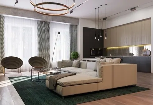 Một tấm thảm lớn cùng ghế sofa đánh dấu khu vực tiếp khách