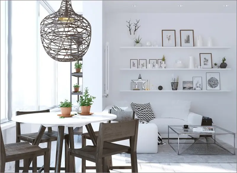 Phòng ăn mang phong cách trẻ trung khi có những giá gỗ gắn trên tường để tranh ảnh, lọ hoa và những vật dụng trang trí khác.