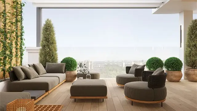 Thay vì sử dụng lan can truyền thống, thiết kế này sử dụng một bức tường kính để bao quanh nửa dưới của ban công mà không cản trở tầm nhìn