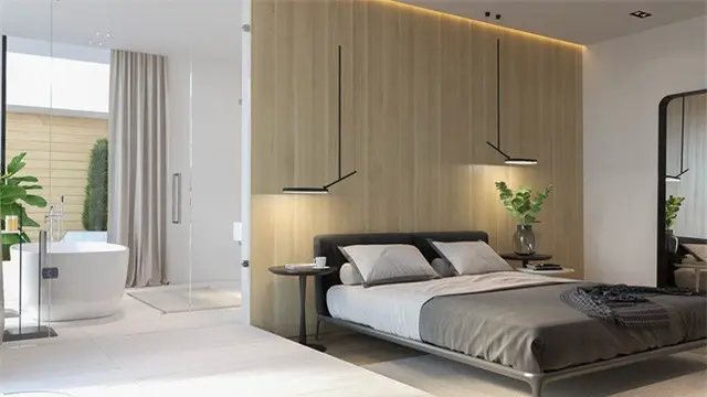 Bức tường kính hiện đại dẫn vào khu vực phòng tắm