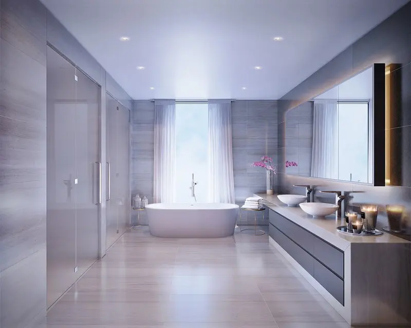 Thiết kế thông minh với rèm cửa, tường kính và một bồn tắm bằng đá cẩm thạch mang đến một nơi thư giãn vừa lãng mạn, vừa ấm cúng mà rất sang trọng.