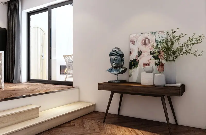 Bên cạnh đó, các yếu tố trang trí như tranh ảnh, bình hoa cũng được khéo léo đưa vào nhà