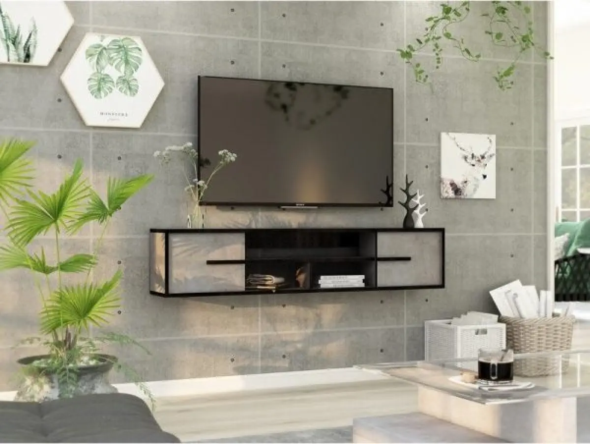 Đường viền màu đen đi cùng khung màu trắng, tạo sự đồng bộ giữa giá và chiếc tivi
