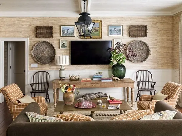 Gam màu này mang lại cảm giác ấm cúng cho phòng khách. Thảm màu be với ghế sofa màu bí ngô cực “ăn rơ” với nhau.